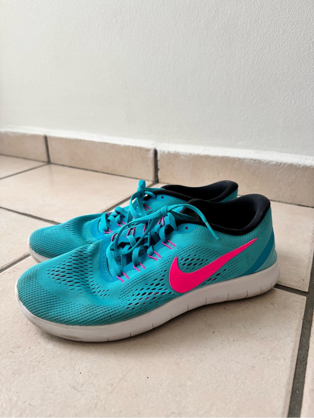 Nike Teal Sneakers with Pink Swoosh